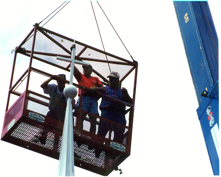 Erecting The Cross On The Top Of The Steeple 